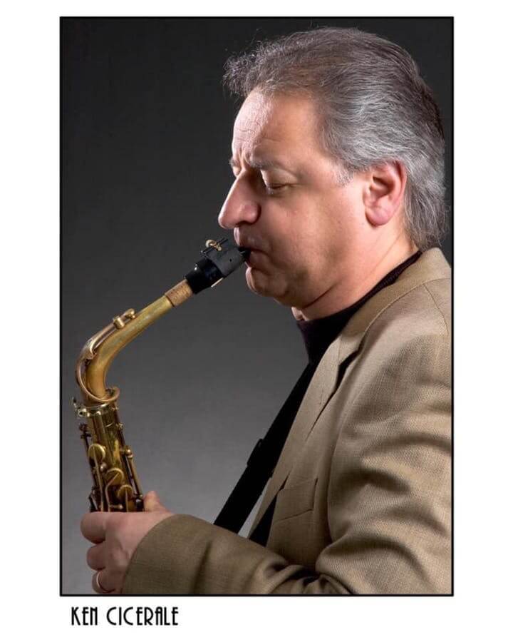 Ken Cicerale playing a saxophone