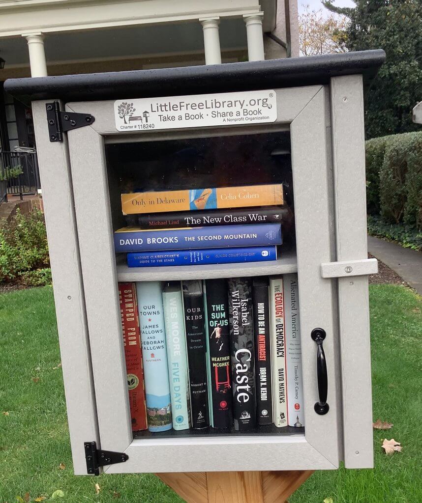 Little Free Library on a front lawn